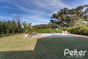 Casa em Condomínio à venda com 366m², 4 dormitórios, 4 suítes, 3 vagas, no bairro Terra Ville em PORTO ALEGRE