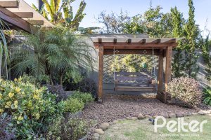 Casa em Condomínio à venda com 366m², 4 dormitórios, 4 suítes, 3 vagas, no bairro Terra Ville em PORTO ALEGRE