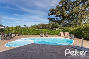 Casa em Condomínio à venda com 366m², 4 dormitórios, 4 suítes, 3 vagas, no bairro Terra Ville em PORTO ALEGRE