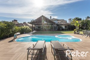 Casa em Condomínio à venda com 366m², 4 dormitórios, 4 suítes, 3 vagas, no bairro Terra Ville em PORTO ALEGRE