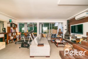 Casa em Condomínio à venda com 327m², 3 dormitórios, 3 suítes, 3 vagas, no bairro Tristeza em PORTO ALEGRE