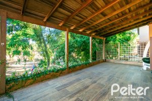 Casa em Condomínio à venda com 327m², 3 dormitórios, 3 suítes, 3 vagas, no bairro Tristeza em PORTO ALEGRE