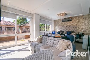 Casa em Condomínio à venda com 327m², 3 dormitórios, 3 suítes, 3 vagas, no bairro Tristeza em PORTO ALEGRE