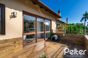 Casa em Condomínio à venda com 327m², 3 dormitórios, 3 suítes, 3 vagas, no bairro Tristeza em PORTO ALEGRE