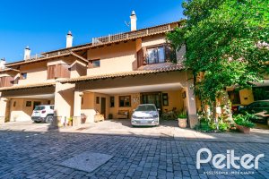 Casa em Condomínio à venda com 327m², 3 dormitórios, 3 suítes, 3 vagas, no bairro Tristeza em PORTO ALEGRE