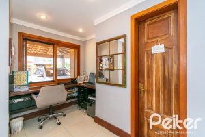 Casa em Condomínio à venda com 216m², 3 dormitórios, 3 suítes, 2 vagas, no bairro Hípica em Porto Alegre