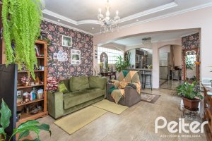 Casa à venda com 292m², 3 dormitórios, 1 suíte, 5 vagas, no bairro Ipanema em Porto Alegre