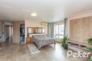 Casa à venda com 292m², 3 dormitórios, 1 suíte, 5 vagas, no bairro Ipanema em Porto Alegre