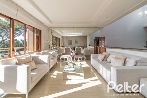 Casa em Condomínio à venda com 386m², 3 dormitórios, 1 suíte, 2 vagas, no bairro Vila Assuncao em Porto Alegre