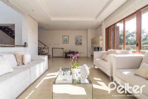 Casa em Condomínio à venda com 386m², 3 dormitórios, 1 suíte, 2 vagas, no bairro Vila Assuncao em Porto Alegre