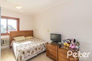 Casa em Condomínio à venda com 386m², 3 dormitórios, 1 suíte, 2 vagas, no bairro Vila Assuncao em Porto Alegre