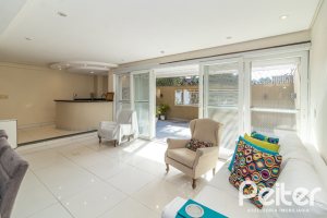 Casa em Condomínio à venda com 386m², 3 dormitórios, 1 suíte, 2 vagas, no bairro Vila Assuncao em Porto Alegre