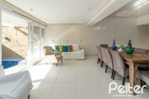 Casa em Condomínio à venda com 386m², 3 dormitórios, 1 suíte, 2 vagas, no bairro Vila Assuncao em Porto Alegre