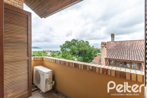 Casa em Condomínio à venda com 186m², 3 dormitórios, 1 suíte, 2 vagas, no bairro Jardim Isabel em Porto Alegre