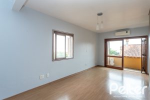 Casa em Condomínio à venda com 186m², 3 dormitórios, 1 suíte, 2 vagas, no bairro Jardim Isabel em Porto Alegre