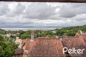 Casa em Condomínio à venda com 186m², 3 dormitórios, 1 suíte, 2 vagas, no bairro Jardim Isabel em Porto Alegre