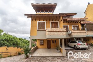 Casa em Condomínio à venda com 186m², 3 dormitórios, 1 suíte, 2 vagas, no bairro Jardim Isabel em Porto Alegre