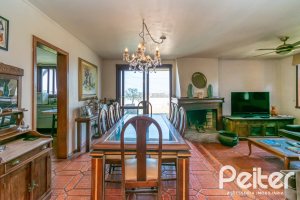 Casa à venda com 255m², 3 dormitórios, 1 suíte, 2 vagas, no bairro Vila Assuncao em Porto Alegre