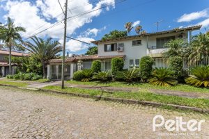 Casa à venda com 359m², 3 dormitórios, 1 suíte, 2 vagas, no bairro Ipanema em Porto Alegre