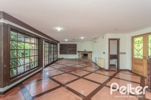 Casa em Condomínio à venda com 493m², 5 dormitórios, 5 suítes, 4 vagas, no bairro Terra Ville em Porto Alegre