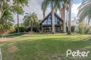 Casa em Condomínio à venda com 493m², 5 dormitórios, 5 suítes, 4 vagas, no bairro Terra Ville em Porto Alegre