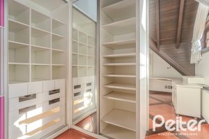 Casa em Condomínio à venda com 493m², 5 dormitórios, 5 suítes, 4 vagas, no bairro Terra Ville em Porto Alegre