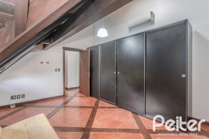 Casa em Condomínio à venda com 493m², 5 dormitórios, 5 suítes, 4 vagas, no bairro Terra Ville em Porto Alegre