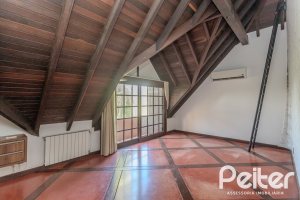 Casa em Condomínio à venda com 493m², 5 dormitórios, 5 suítes, 4 vagas, no bairro Terra Ville em Porto Alegre