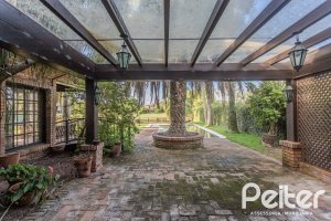 Casa em Condomínio à venda com 493m², 5 dormitórios, 5 suítes, 4 vagas, no bairro Terra Ville em Porto Alegre