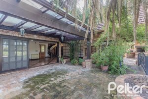 Casa em Condomínio à venda com 493m², 5 dormitórios, 5 suítes, 4 vagas, no bairro Terra Ville em Porto Alegre