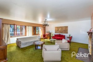 Casa à venda com 564m², 5 dormitórios, 2 suítes, 4 vagas, no bairro Vila Assunção em Porto Alegre