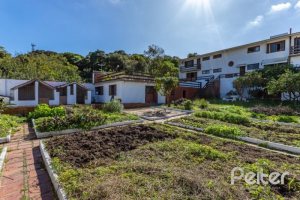 Casa à venda com 564m², 5 dormitórios, 2 suítes, 4 vagas, no bairro Vila Assunção em Porto Alegre