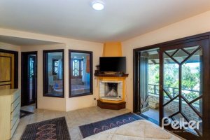 Casa à venda com 600m², 4 dormitórios, 4 suítes, 4 vagas, no bairro Vila Conceição em Porto Alegre