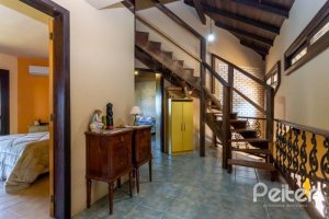 Casa à venda com 600m², 4 dormitórios, 4 suítes, 4 vagas, no bairro Vila Conceição em Porto Alegre