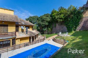 Casa à venda com 600m², 4 dormitórios, 4 suítes, 4 vagas, no bairro Vila Conceição em Porto Alegre