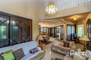 Casa à venda com 600m², 4 dormitórios, 4 suítes, 4 vagas, no bairro Vila Conceição em Porto Alegre