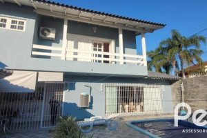 Casa à venda com 351m², 4 dormitórios, 1 suíte, 2 vagas, no bairro Ipanema em Porto Alegre