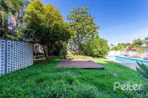 Casa à venda com 519m², 4 dormitórios, 4 suítes, 4 vagas, no bairro Vila Assuncao em Porto Alegre