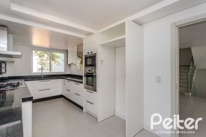 Casa em Condomínio à venda com 304m², 4 dormitórios, 4 suítes, 3 vagas, no bairro Tristeza em Porto Alegre
