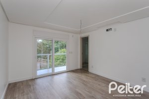 Casa em Condomínio à venda com 304m², 4 dormitórios, 4 suítes, 3 vagas, no bairro Tristeza em Porto Alegre