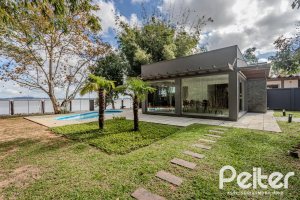 Casa em Condomínio à venda com 280m², 4 dormitórios, 4 suítes, 3 vagas, no bairro Tristeza em Porto Alegre