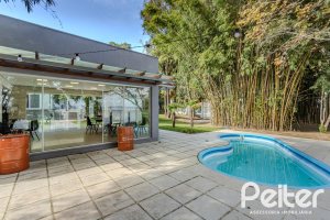 Casa em Condomínio à venda com 280m², 4 dormitórios, 4 suítes, 3 vagas, no bairro Tristeza em Porto Alegre