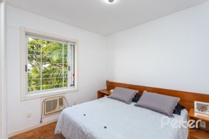 Casa à venda com 420m², 4 dormitórios, 1 suíte, 4 vagas, no bairro Nonoai em Porto Alegre