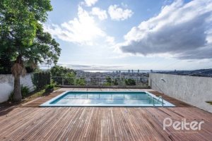 Casa à venda com 420m², 4 dormitórios, 1 suíte, 4 vagas, no bairro Nonoai em Porto Alegre