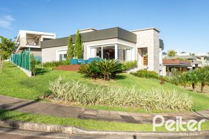 Casa em Condomínio à venda com 253m², 3 dormitórios, 3 suítes, 2 vagas, no bairro Alphaville em PORTO ALEGRE