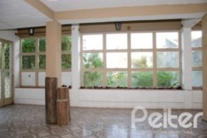 Casa à venda com 300m², 4 dormitórios, 2 suítes, 4 vagas, no bairro Vila Assunção em Porto Alegre