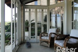 Casa à venda com 400m², 3 dormitórios, 1 suíte, 3 vagas, no bairro Jardim Isabel em Porto Alegre