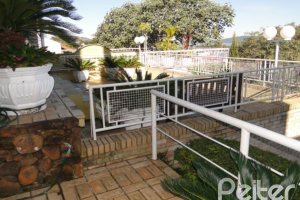 Casa à venda com 400m², 3 dormitórios, 1 suíte, 3 vagas, no bairro Jardim Isabel em Porto Alegre