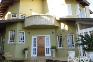 Casa à venda com 400m², 3 dormitórios, 1 suíte, 3 vagas, no bairro Jardim Isabel em Porto Alegre