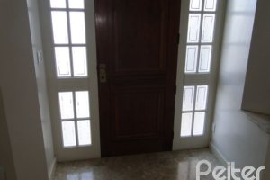 Casa à venda com 400m², 3 dormitórios, 1 suíte, 3 vagas, no bairro Jardim Isabel em Porto Alegre